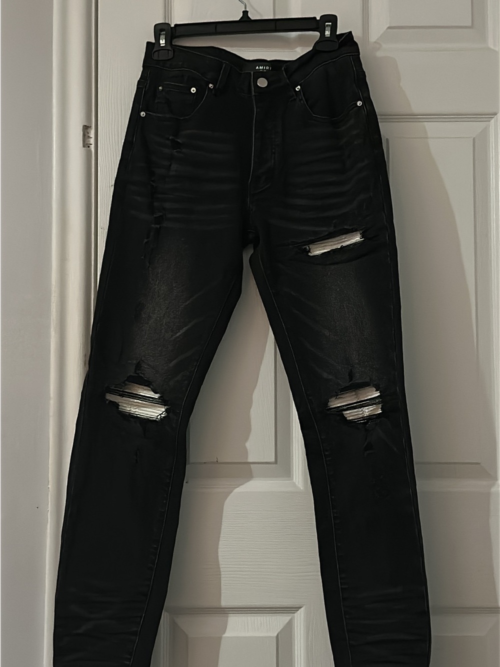 AMIRI Black Distressed Skinny Jeans